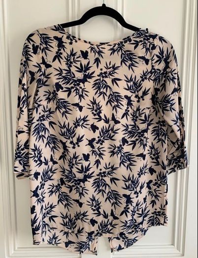 Ladies Beige blouse featuring a navy blue leaf and butterfly pattern: Size 8