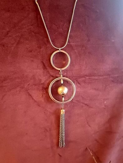 Long two-tone and tassel necklace
