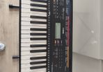 Yamaha keyboard and stand