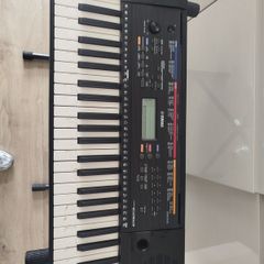 Yamaha keyboard and stand