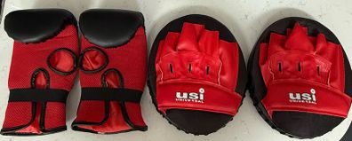 2 USI Universal boxing gloves and pads, unused.