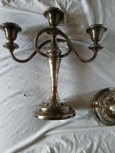 a matching pair of traditional three light candlelabras silver plated