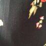 Black dress with flower design from Almost Famous Image 2