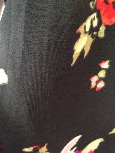 Black dress with flower design from Almost Famous