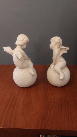 Lovely Vintage Pair of Ceramic Baby Winged Angels Sitting on Globes with a Very Tactile Cream Coloured Crackle Glaze
