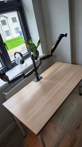 Basic IKEA desk with triple monitor arm