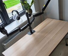 Basic IKEA desk with triple monitor arm