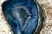 Polished blue agate geode slice.