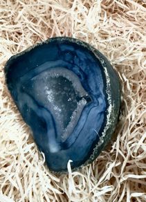 Polished blue agate geode slice.