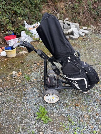 Powacaddy electric trolley with titleist golf bag