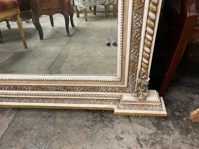 Very nice large mirror with light tones and architectural design