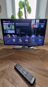 Samsung 42 inch TV and swivel stand.