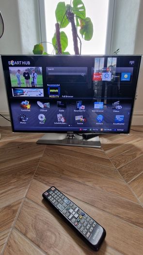 Samsung 42 inch TV and swivel stand.