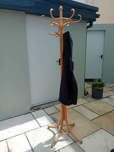 Wooden rotating coat stand
