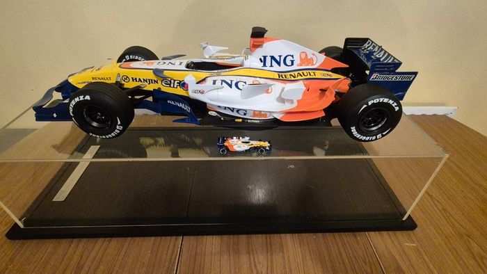 A 1:6 scale (32 inches long Formula 1 car) limited edition model of the 2007 Season ING Renault R27 F1 Team car