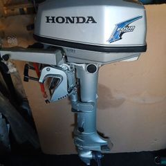 Honda longshaft outboard.