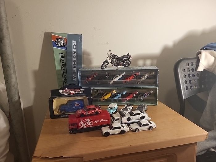 Assortment of diecast, primarily hot wheels premium, but includes a bike and lledo