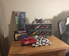 Assortment of diecast, primarily hot wheels premium, but includes a bike and lledo
