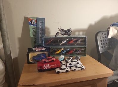 Assortment of diecast, primarily hot wheels premium, but includes a bike and lledo