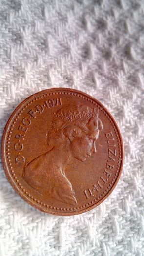 1971 U.K. New Penny plus 1971 Two New Pence.