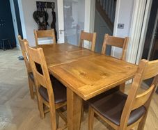 Extendable Solid Oak Dining Table & 6 leather dining chairs