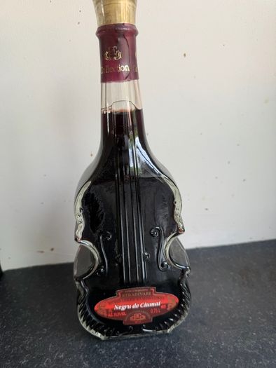 Collectors Red Wine Bottle shaped like a Stradivarius