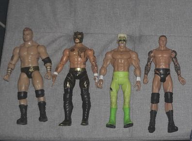 WWE Action Figures: MJF, Rey Fenix, Surfer Sting, Randy Orton.