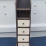Small vintage wooden storage unit with heavy ceramic drawers with brass knobs Image 2