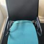 Office chairs with black frames and teal seats Image 4