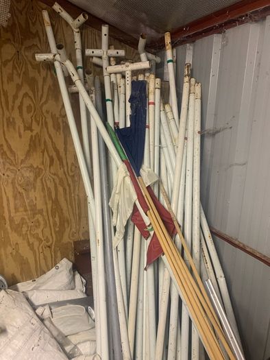 Old dirty chairs and marquis poles