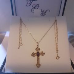 9 karat gold chain and cross