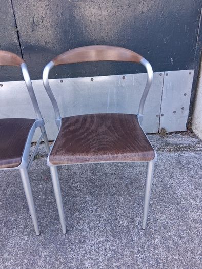 Pair of Piuma occasional chairs designed by Origlia