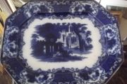 a large antique meat platter called flow blue date 1850