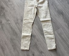 ladies cream skinny jeans