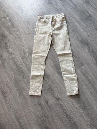 ladies cream skinny jeans