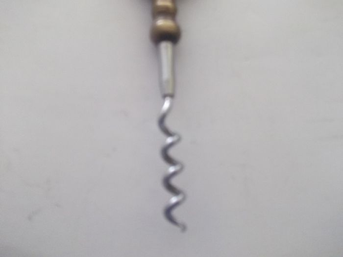 a vintage cok screw brass and steel