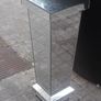 a shops display stand with mirror all round it Image 3
