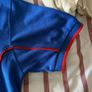 Smyths Toys Polo Shirt Small Image 4