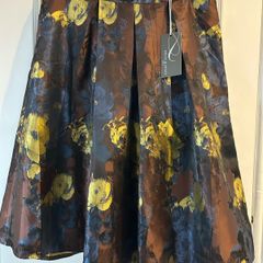 Never worn skirt  still with tag .