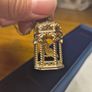 Vintage gilded bird cage with a bird pendant. Image 8