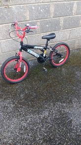 Children's black and red ninja bike