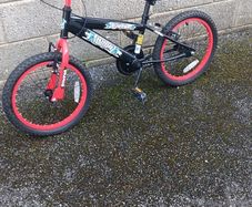 Children's black and red ninja bike