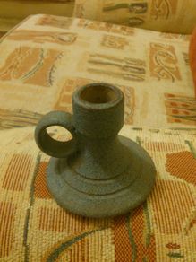 Candle holder very nice with AA on bottom of holder .