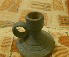 Candle holder very nice with AA on bottom of holder .