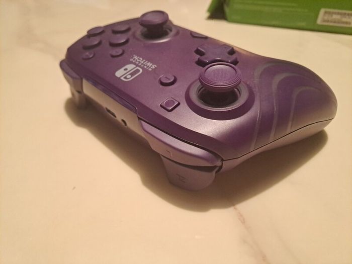 Nintendo Switch PDP Afterglow Wave Purple controller
