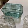 3 pieces of vintage table / dinner ware - A ribbed lidded glass butter dish , vintage 3 footed sugar bowl and cut glass milk jug Image 3