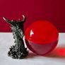 Red crystal/glass ball and metal dragon stand. Image 5