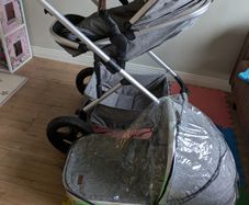 Pram with carry cot and foot muff