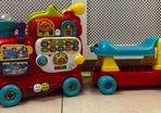 Fisher price ride on train and activity Center