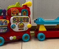 Fisher price ride on train and activity Center